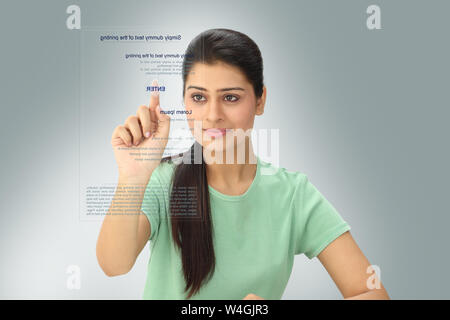 Woman using futuristic touch screen Stock Photo
