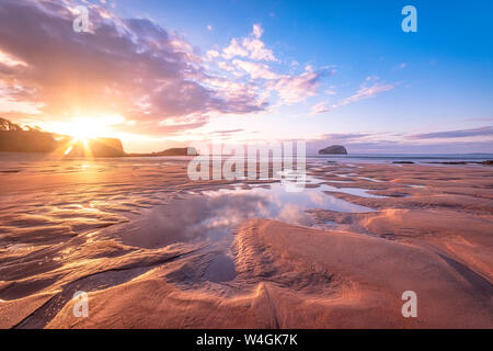 Bass Rock in distance at sunset, North Berwick, East Lothian, Scotland Stock Photo