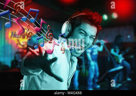 Musical notes coming out of man mouth Stock Photo