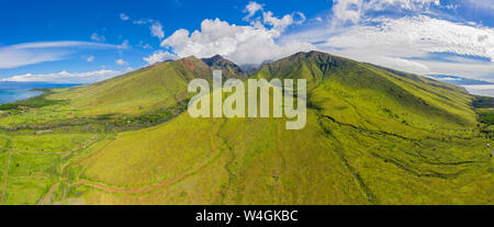 Aerial view over West Maui Mountains and Pacific Ocean with Puu Kukui, Maui, Hawaii, USA Stock Photo