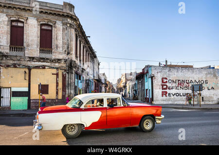 Driving vintage car, Havana, Cuba Stock Photo