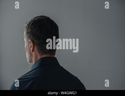 Rear view of mature businessman Stock Photo
