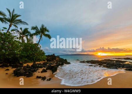 Secret Beach at sunset, Maui, Hawaii, USA Stock Photo