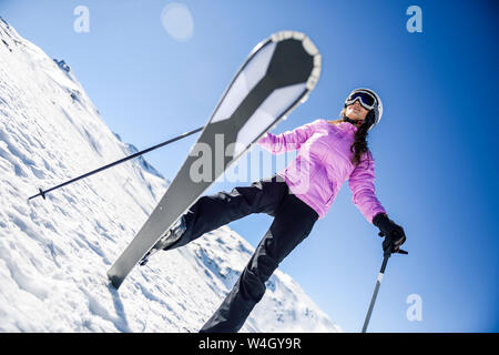 Happy woman in snow-covered landscape in Sierra Nevada, Andalusia, Spain Stock Photo