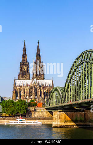 View to Cologne Cathedral with Hohenzollern Bridge and River Rhine in the foreground, Cologne, Germany Stock Photo