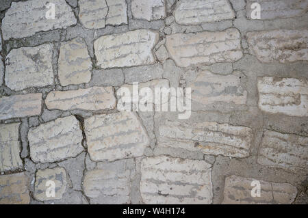 Old and Worn Out Stone Pavement in City of Vrsar, Istria Stock Photo