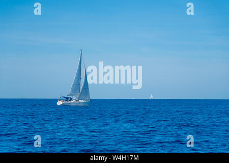 Lonely Yacht sailing on opened sea, Croatia Stock Photo