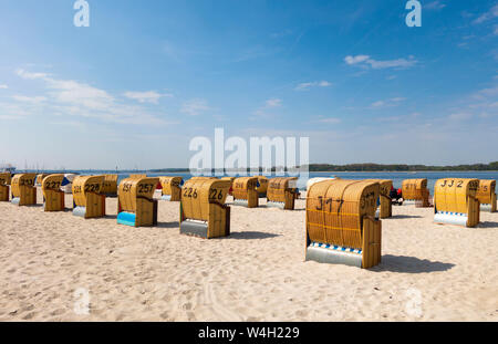 Beach with hooded  beach chairs, Baltic sea seaside resort Laboe, East bank, Kieler Foerde, Schleswig-Holstein, Germany Stock Photo