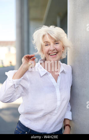 Portrait of laughing mature woman Stock Photo - Alamy