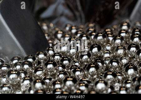 silver balls spheres many of in a shop Stock Photo
