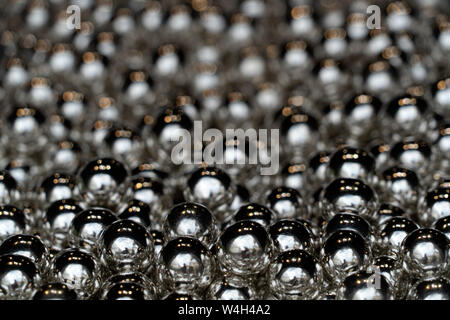 silver balls spheres many of in a shop Stock Photo