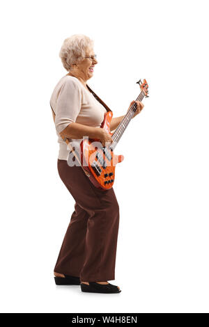 Full length shot of a senior lady playing an electric guitar isolated on white background Stock Photo