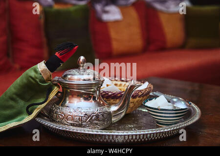 Detail of traditional Moroccan tea pot with sugar Stock Photo