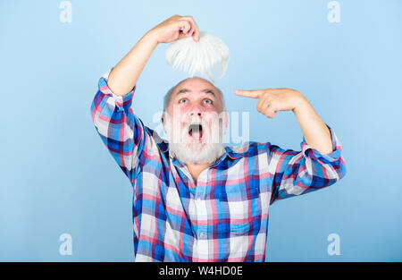 Health care concept. Elderly people. Bearded grandfather grey hair. Male pattern baldness genetic condition caused by variety factors. Hair loss. Early signs balding. Man losing hair. Artificial hair. Stock Photo