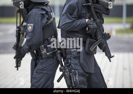 Police, riot police officers, with full protective equipment and MP5 submachine guns, Stock Photo