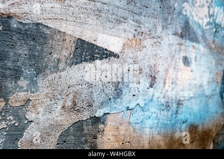 Stylized banner with space for text. Texture of decorative plaster for designer. Grungy wall with colorful lighting. Old gray surface for background Stock Photo