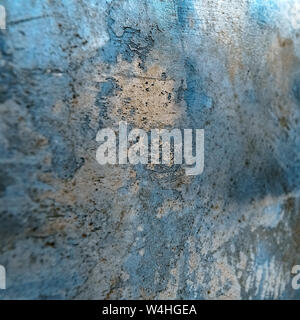 Stylized banner with space for text. Texture of decorative plaster for designer. Grungy wall with colorful lighting. Old gray surface for background i Stock Photo