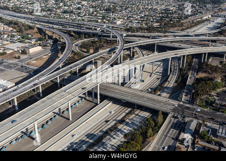 Aerial view of the Harbor 110 and 105 freeway interchange roads and bridges south of downtown Los Angeles in Southern California. Stock Photo