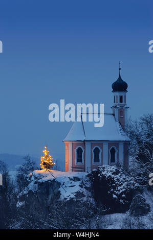 Chapel with illuminated christmas tree in Upper Bavaria, Bavaria ...