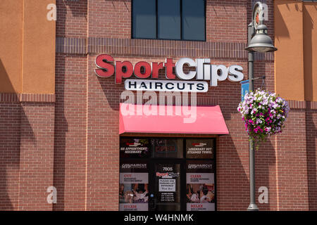 Maple Grove, Minnesota - July 21, 2019: Exterior of a SportClips Haircuts salon and barber shop Stock Photo