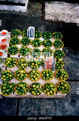 Limes in a street market in Manila in Luzon Metro Manila in the Philippines in Southeast Asia Far East Stock Photo