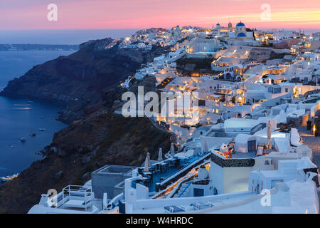 Panoramic view  of Oia, a small village on the edge of the caldera just after sunset, Santorini, Greece