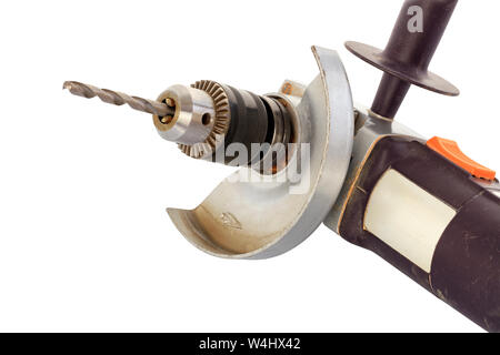 The original solution, the old angle grinder, is used as a drill with a metal chuck and drill bits, isolated on a white background. Stock Photo