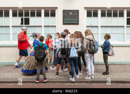 Abdication house, Rochester, UK, German student tour group with local guide in 'period' costume Stock Photo