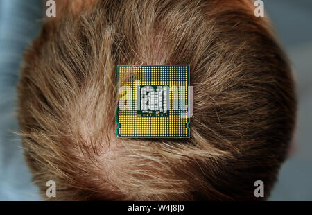 CPU is on the top of the human head. Top view. Stock Photo
