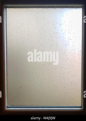 Raindrops on a blured window Stock Photo