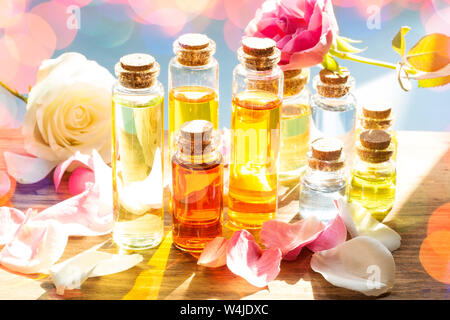 Essence oil  with  rose petals Stock Photo