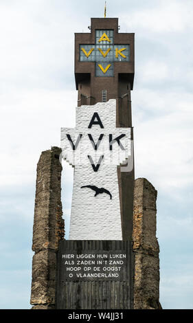 Diksmuide, Flanders, Belgium -  June 19, 2019: Black on White Crypt memorial, remnants of dynamited tower, and top of new IJzertoren, tallest peace mo Stock Photo