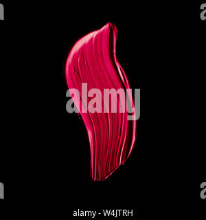 Art abstract, cosmetic product and hand painted design concept - Pink lipstick brush stroke texture isolated on black background Stock Photo