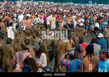 Saugerties, New York, USA, August, 1994 Massive crowds fill the muddy fields at the Winston Farm during Woodstock 94 a music festival to commemorate the 25th anniversary of the original Woodstock festival Stock Photo