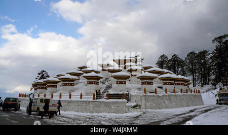 Dochula Pass in the snow, mountain pass on the road from Thimpu to Punakha, with 108 chortens Stock Photo