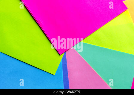 Neon paper samples colorful. Geometric trendy pattern, colored paper,  bright colors.Contemporary colorful paper with rainbow lights Stock Photo -  Alamy