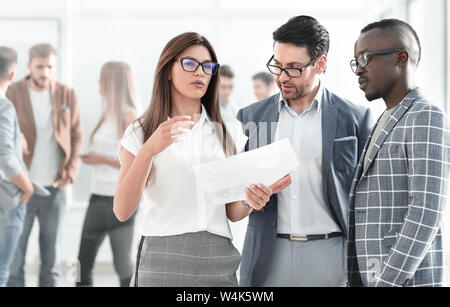 group of business people discussing a business document Stock Photo