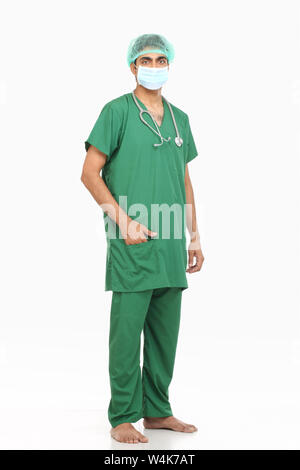Indian surgeon standing with his hands in pockets Stock Photo