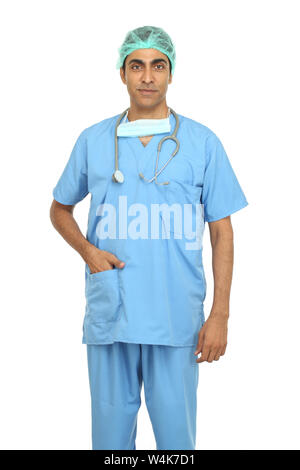 Surgeon standing with his hands in pockets Stock Photo