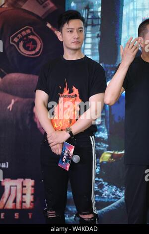 Chengdu, China. 23rd July, 2019. The director Tony Chan and main cast Xiaoming Huang and Zhuo Tan promoted their new film °The Bravest± in Chengdu, Sichuan, China on 23 July, 2019.(Photo by TPG) Credit: TopPhoto/Alamy Live News Stock Photo