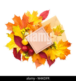 Autumn leaves, gift box and envelopes on a white background. Top view. Stock Photo