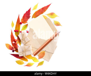 Autumn background with pencils, envelopes and colorful leaves. Top view. Space for your text. Stock Photo