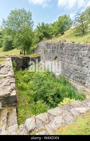 The remains of a water wheel pit at Low Slitt Lead Mine above Westgate, in Weardale, Co. Durham, England, UK Stock Photo