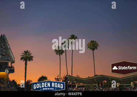 Los Angeles, CA, USA. 23rd July, 2019. The sun sets behind Dodger Stadium during the game between the Los Angeles Angels of Anaheim and the Los Angeles Dodgers at Dodger Stadium in Los Angeles, CA. (Photo by Peter Joneleit) Credit: csm/Alamy Live News Stock Photo