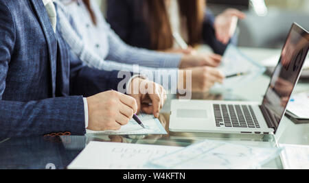 closeup of business team is working with financial documents at workplace in the office. Stock Photo