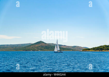 Lonely Yacht sailing on opened sea, Croatia Stock Photo