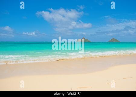 View of the Mokulua Islands at Lanikai Beach, Hawaii Stock Photo