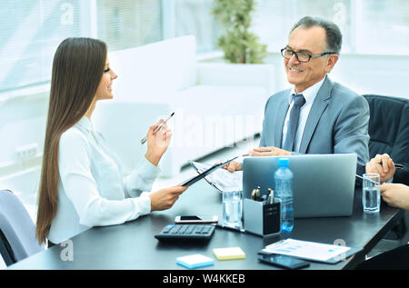 business partners to discuss cooperation plan for the workplace Stock Photo