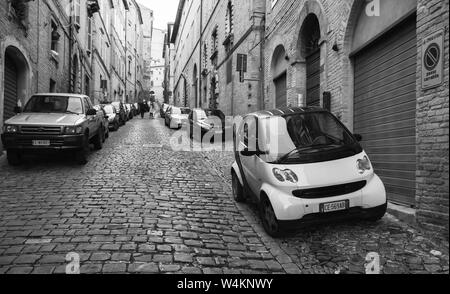 Fermo, Italy - February 11, 2016: Black and white perspective street view photo of Fermo, Italian old town Stock Photo