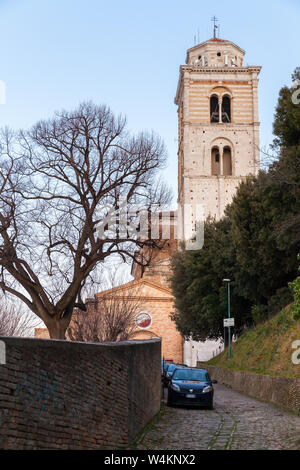 Fermo, Italy - February 11, 2016: Street view with Fermo Cathedral, Ancient Roman Catholic cathedral in Fermo town, region of Marche, Italy Stock Photo